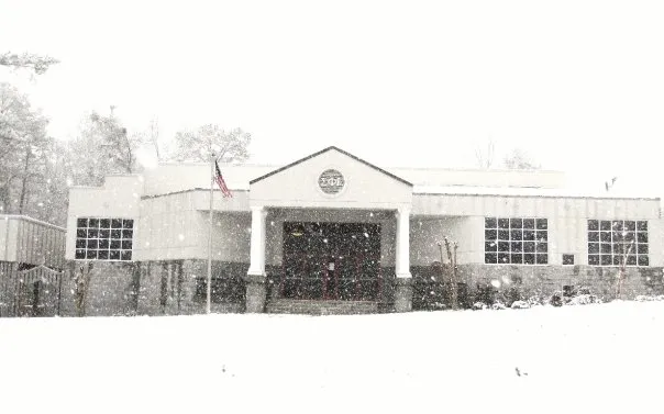 The fraternity house in the cold.