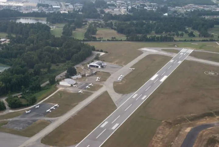 View of runway from a plane on approach.