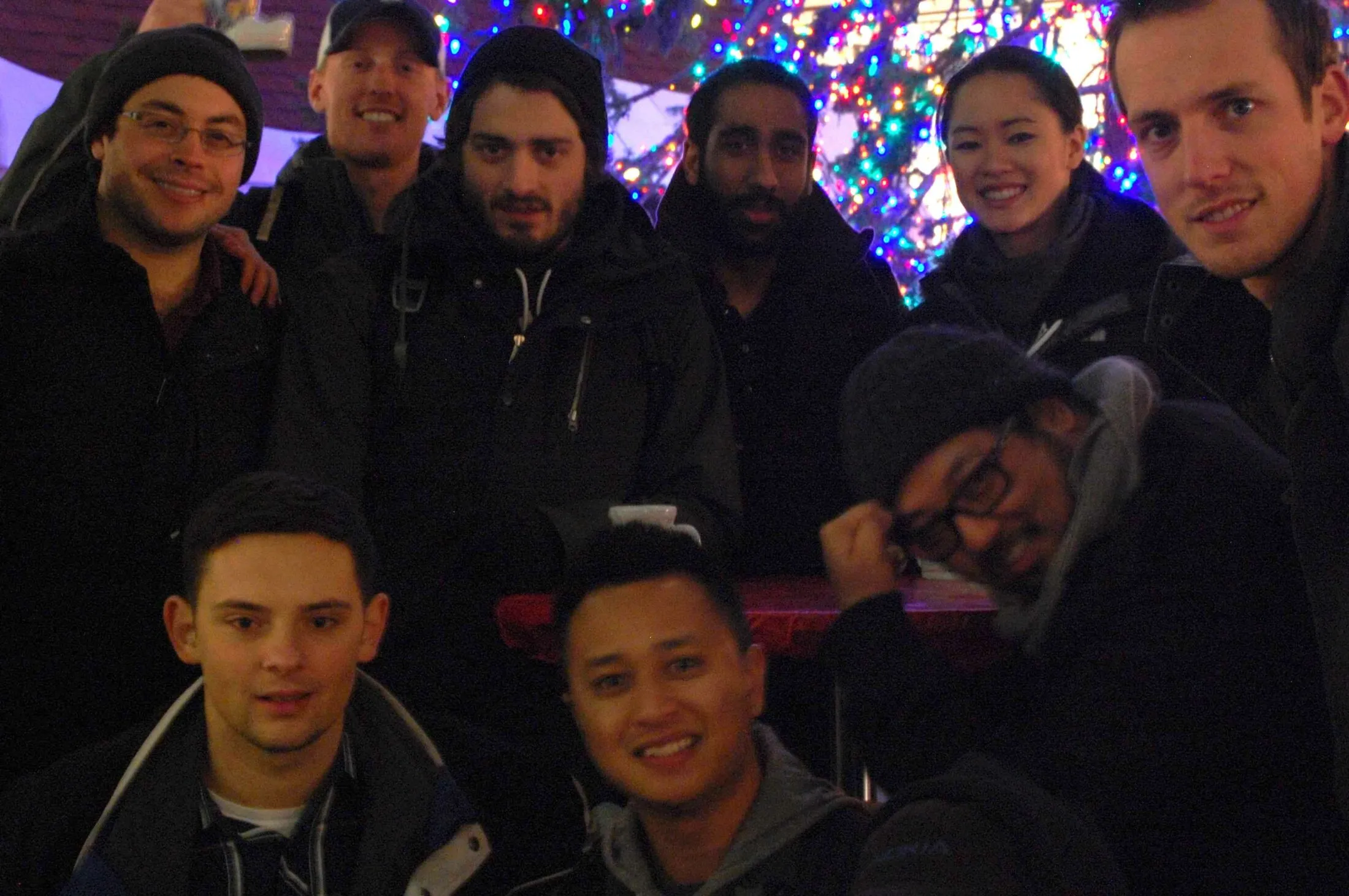 Starter League crew in front of the big tree at the Christkindlmarket.