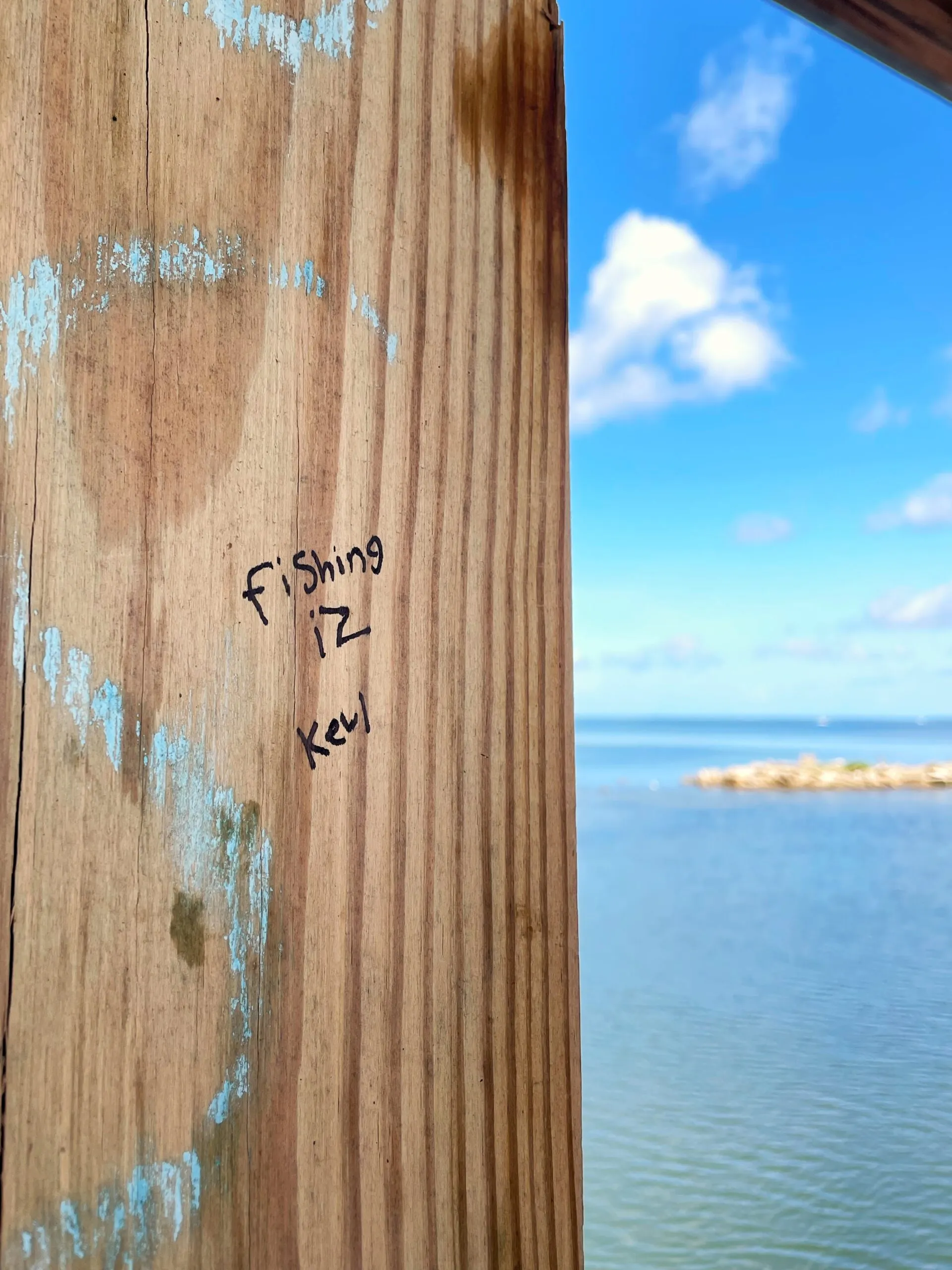 "Fishing iz Kewl" is written on a post in the gazebo.