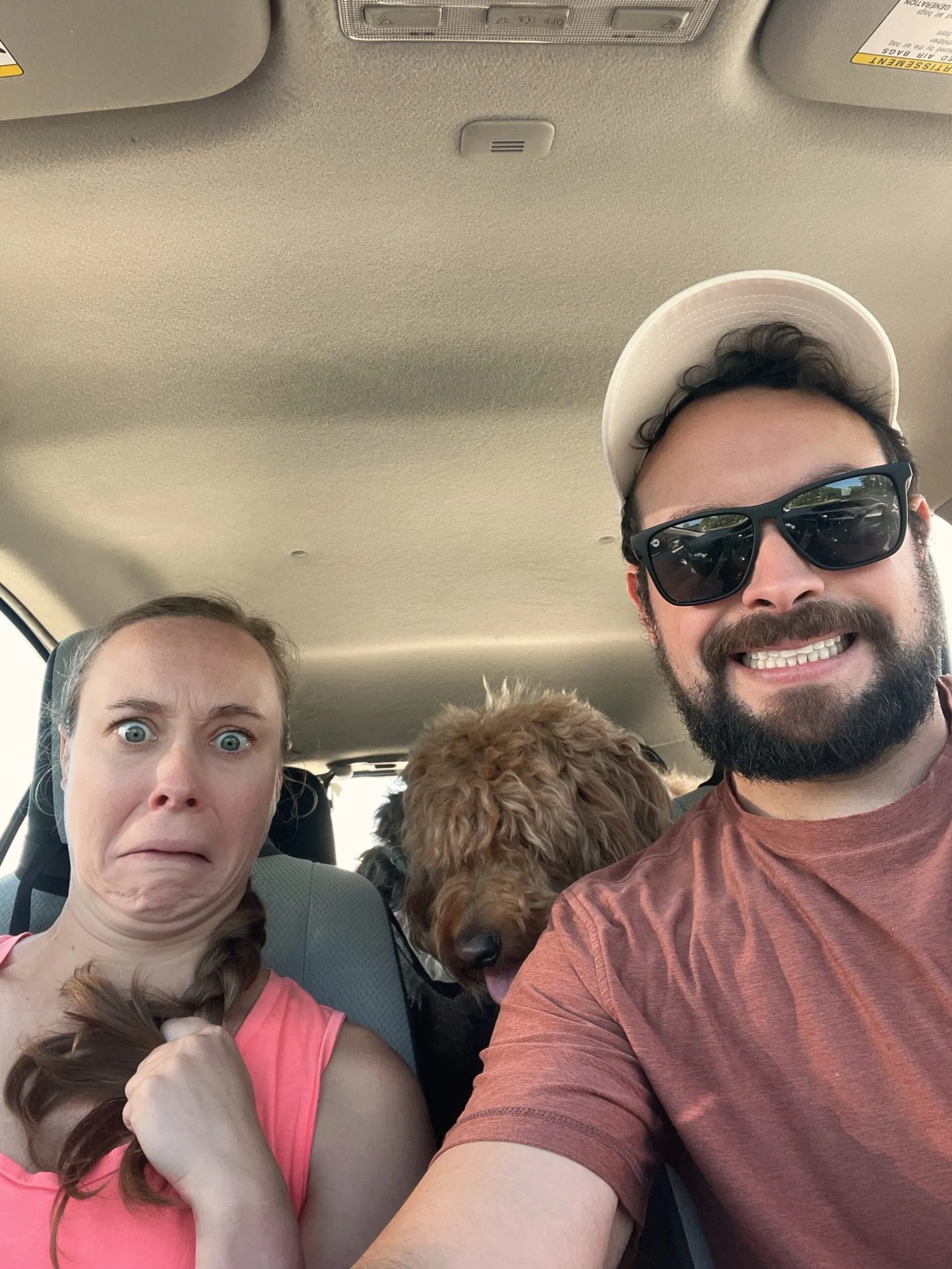 Holly, Remi and Sam in the car making funny faces.
