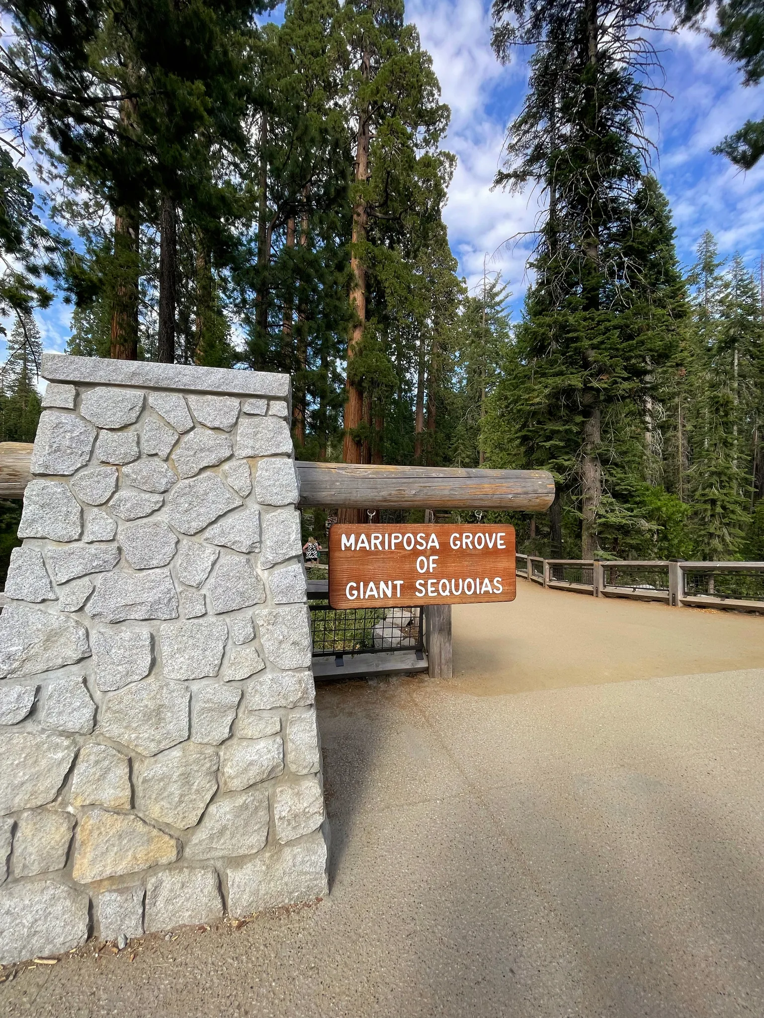 Sign reading Mariposa Grove of Giant Sequoias.