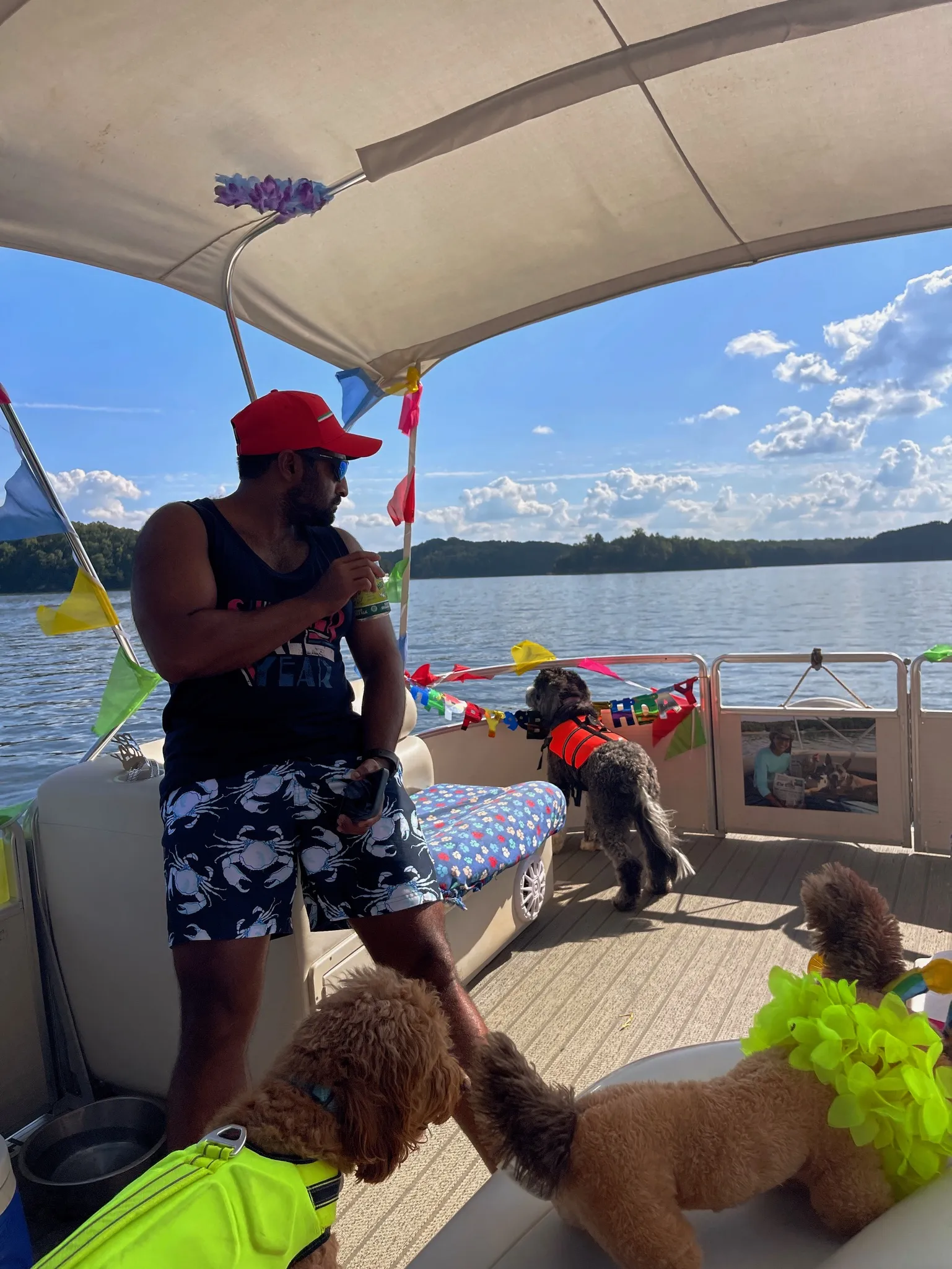 Andy leaning against the boat.