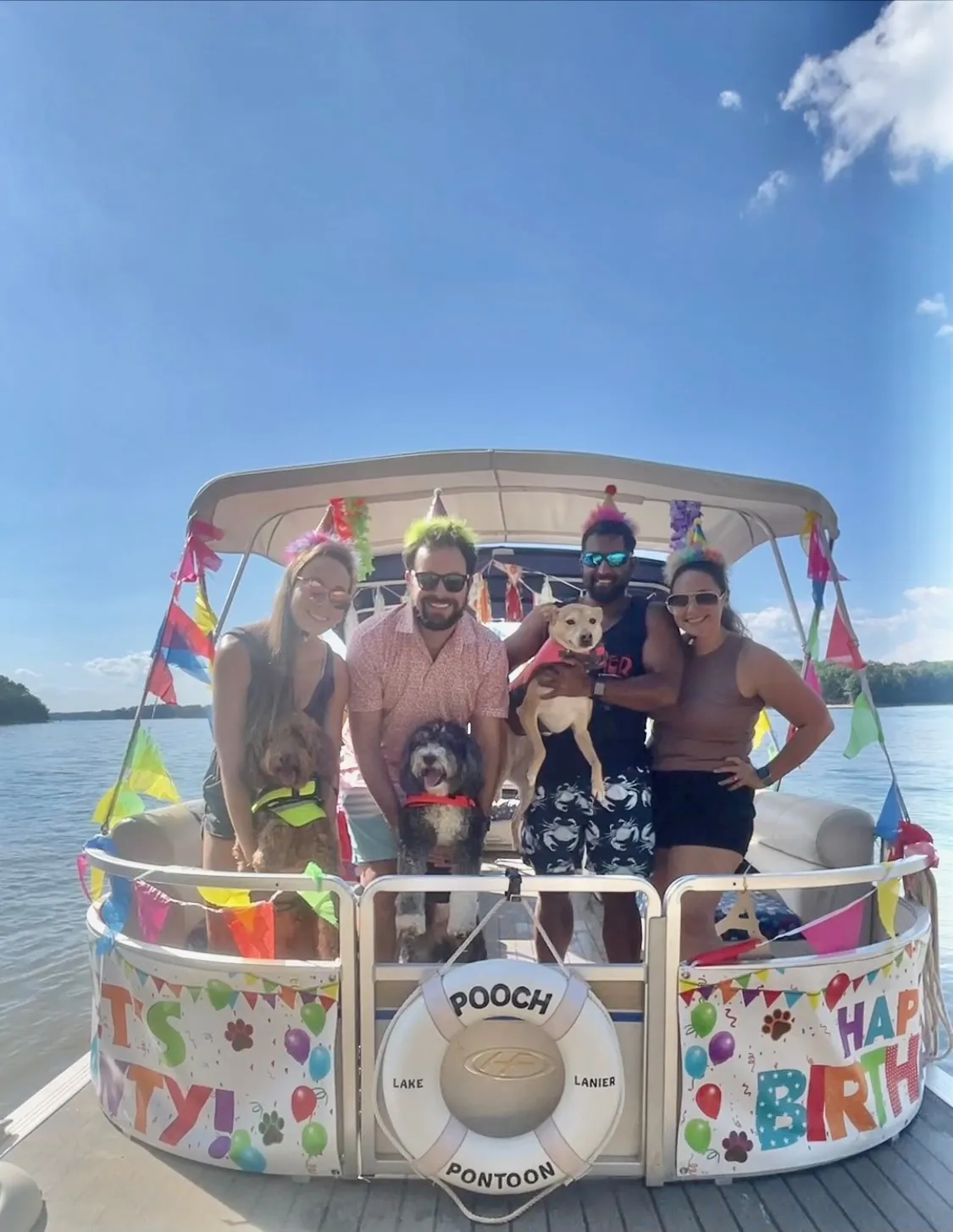 We all pose for a picture on the front of the boat.