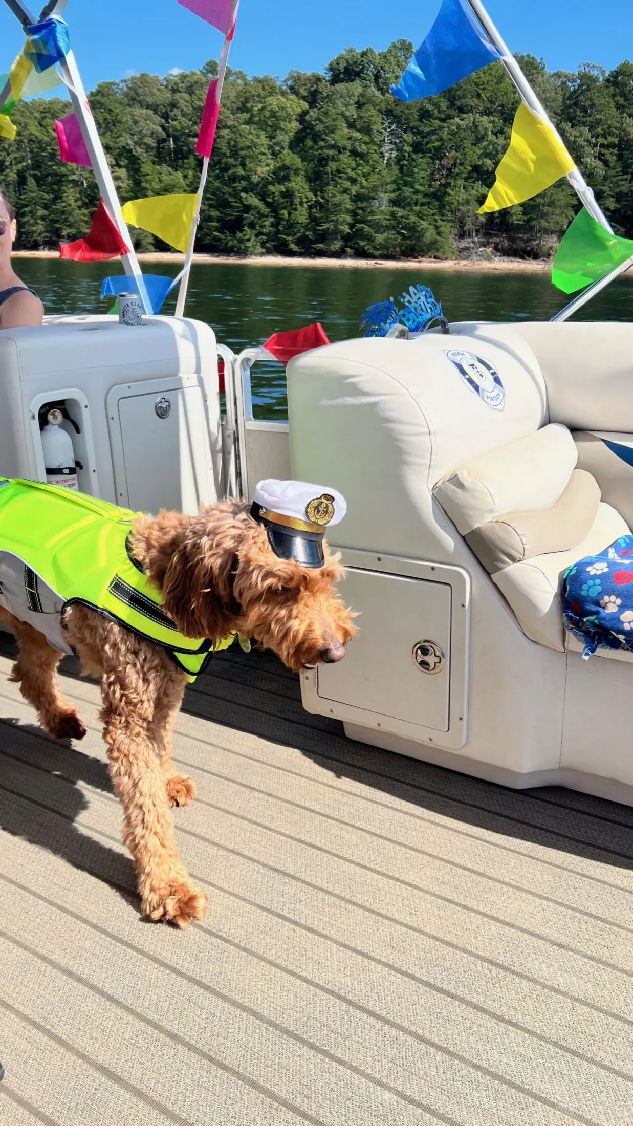 Remi walking with a captains hat.