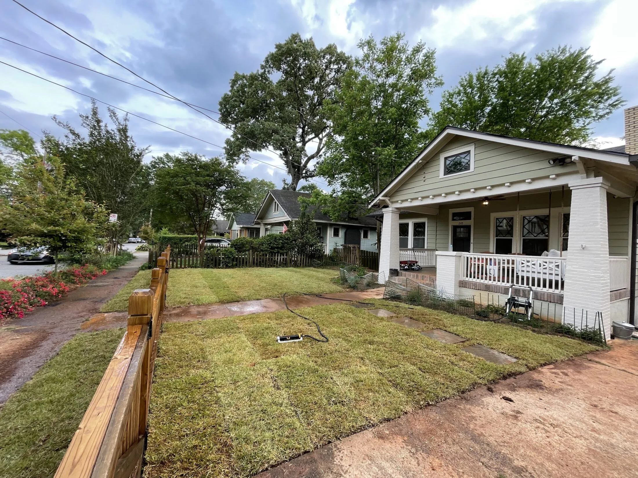 Watering the new sod.