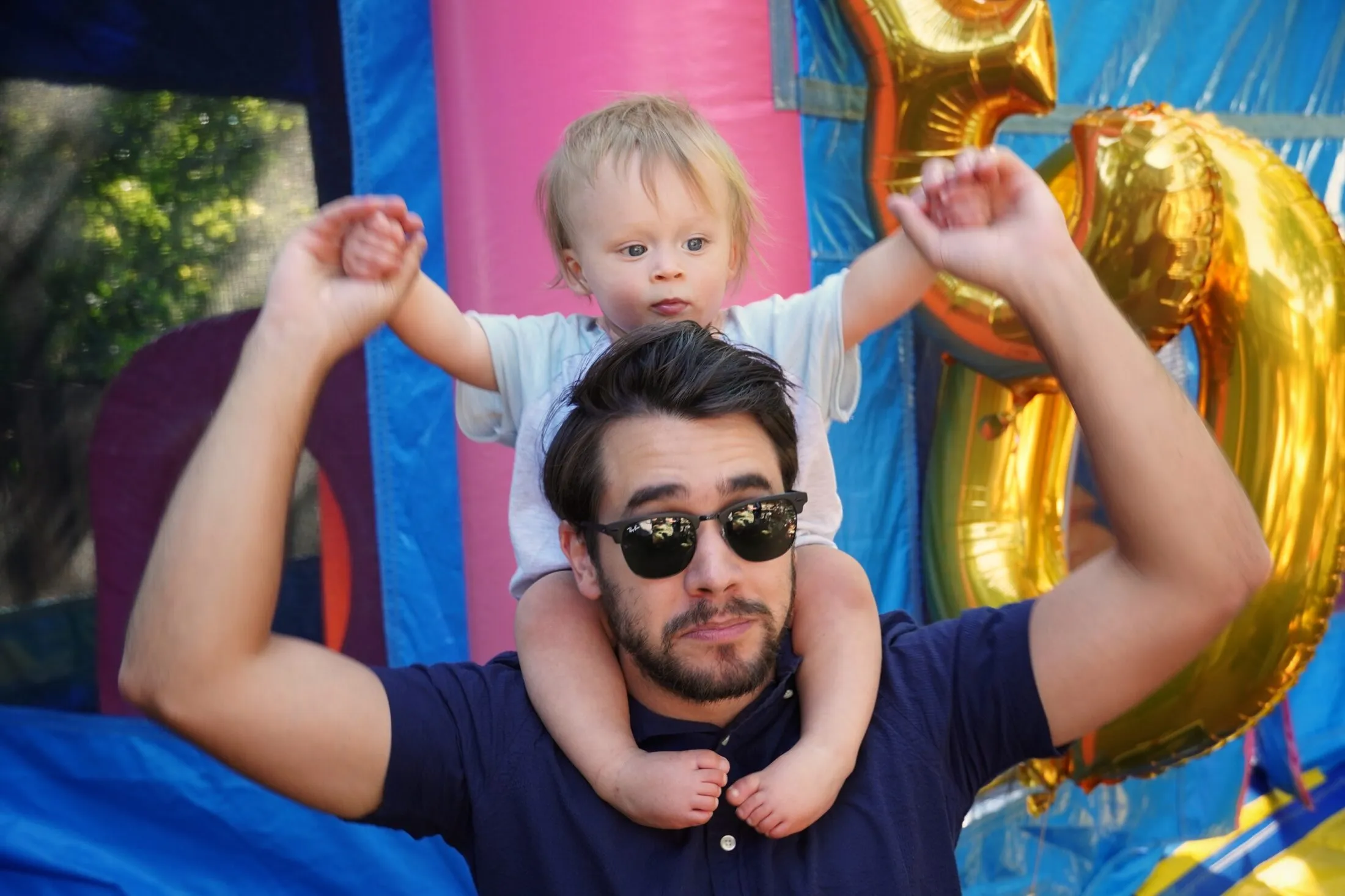 Theo on David's shoulders.