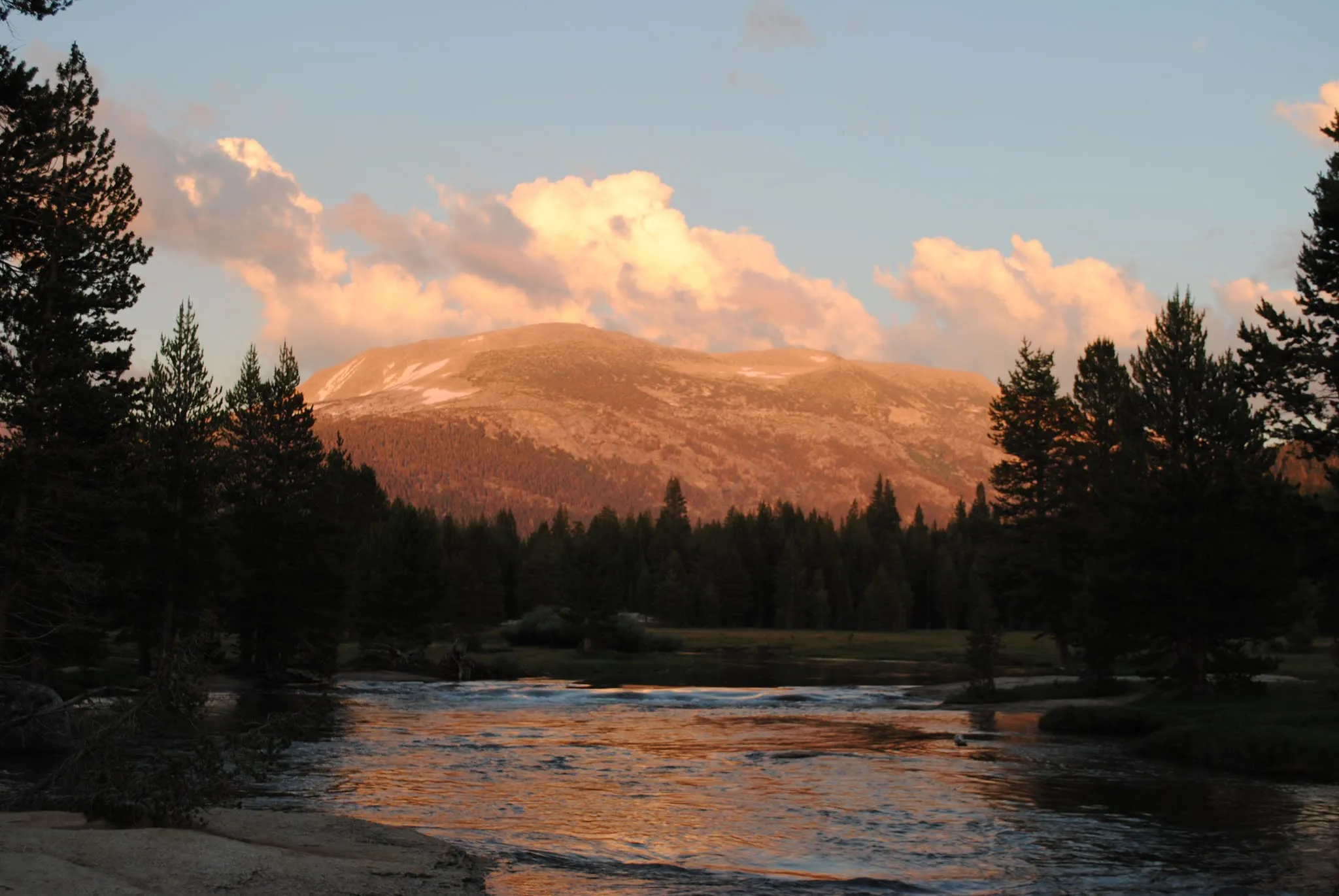 River and a mountain at sunset.
